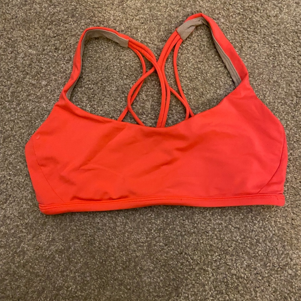 Lululemon bright orange sports bra